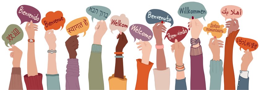 Raised arms and hands of multi-ethnic people from different nations and continents holding speech bubbles with text -thank you- in various international languages.Communication.Equality (öffnet Vergrößerung des Bildes) Willkommen (öffnet Vergrößerung des Bildes)