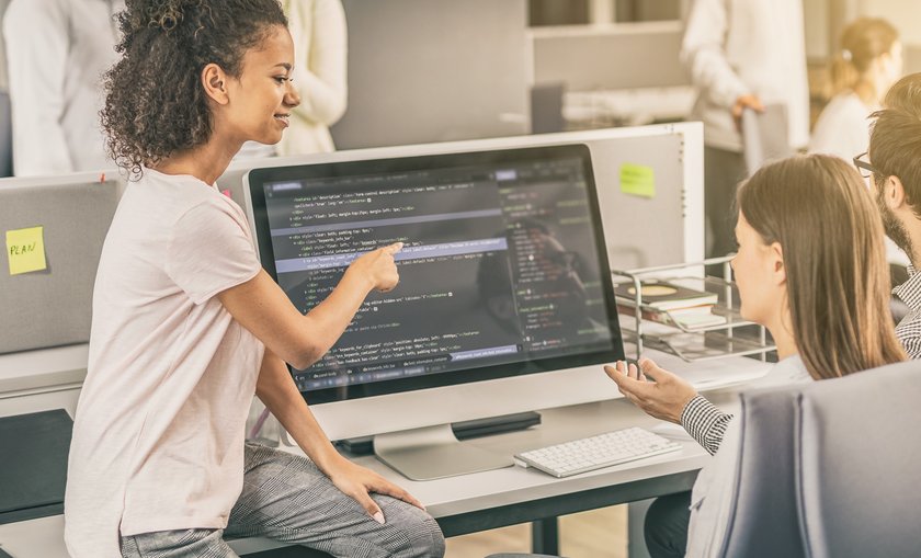 Two young women programming. (opens enlarged image)