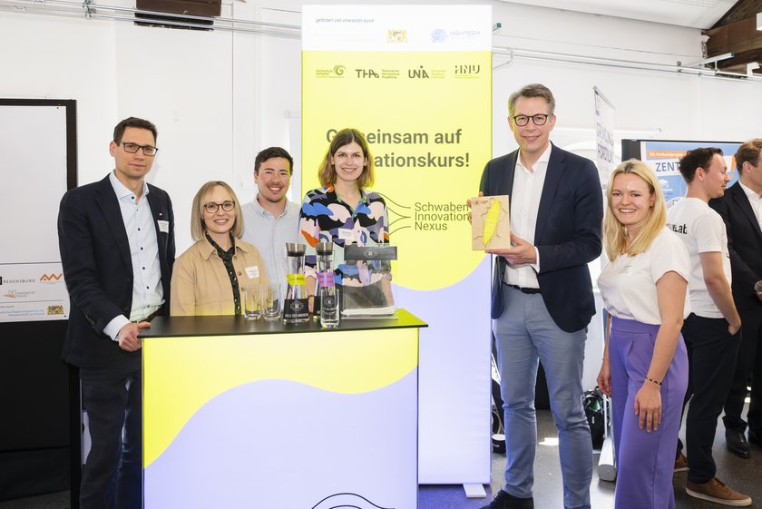 (opens enlarged image) Group photo in front of the stand with Markus Blume. (opens enlarged image)