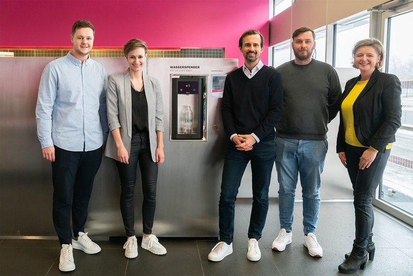 (opens enlarged image) Group photo in front of the water dispenser (opens enlarged image)